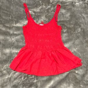 Red ruffled tank top with polkadots